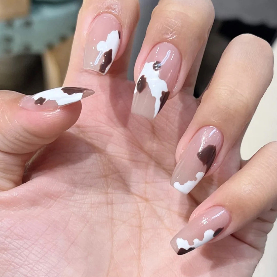 Artistic acrylic nails with elegant gradient and creative designs Kalsten