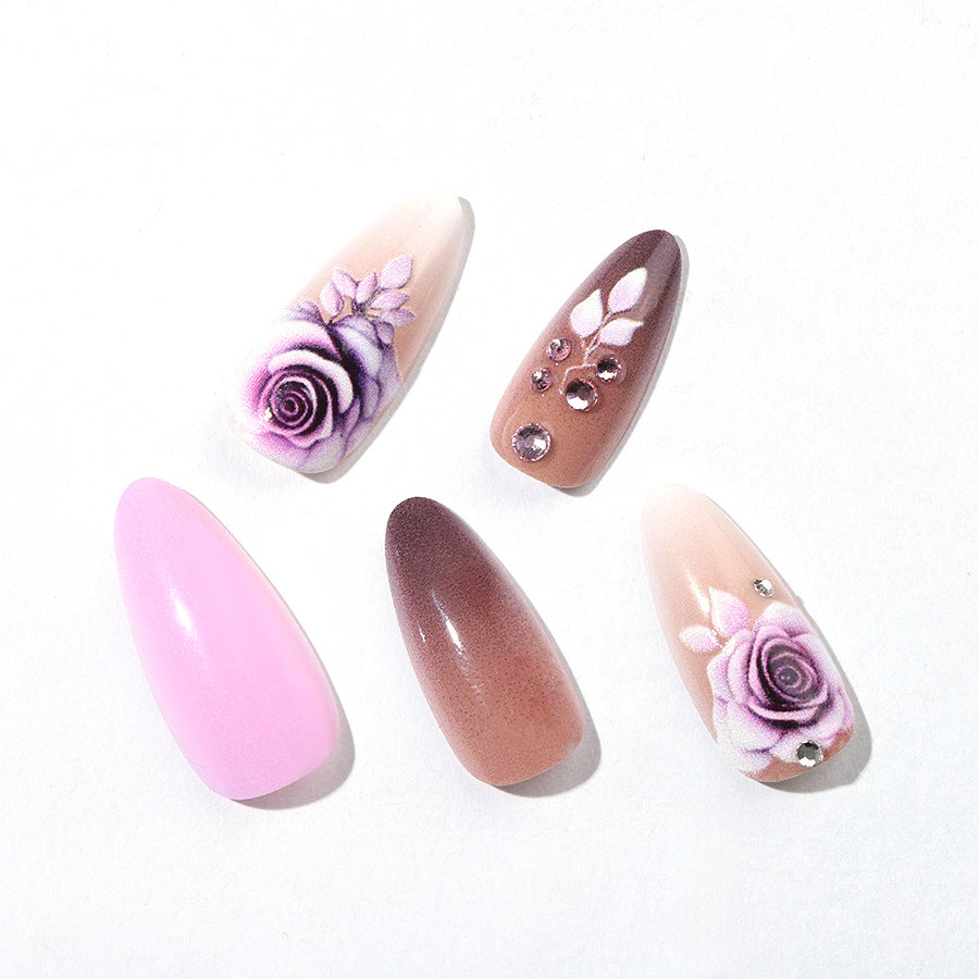 Creative nail art set with elegant rose accents and soft color gradient Kalsten