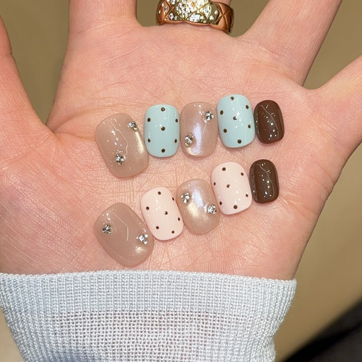 Acrylic nails with rhinestones and glitter Kalsten