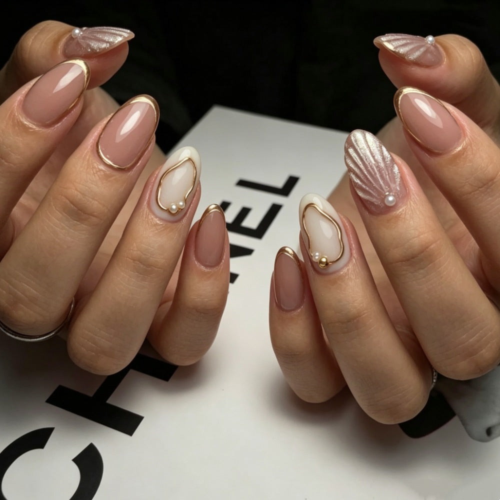 Artistic Press-On Nail Design with Gold Embellishments Kalsten