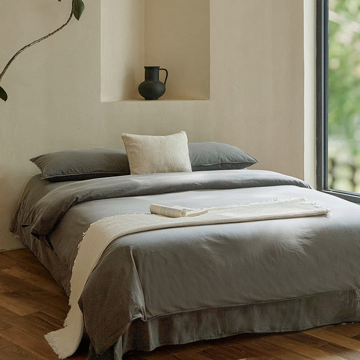 Linen bedding set with duvet cover, pillowcases and bed skirt