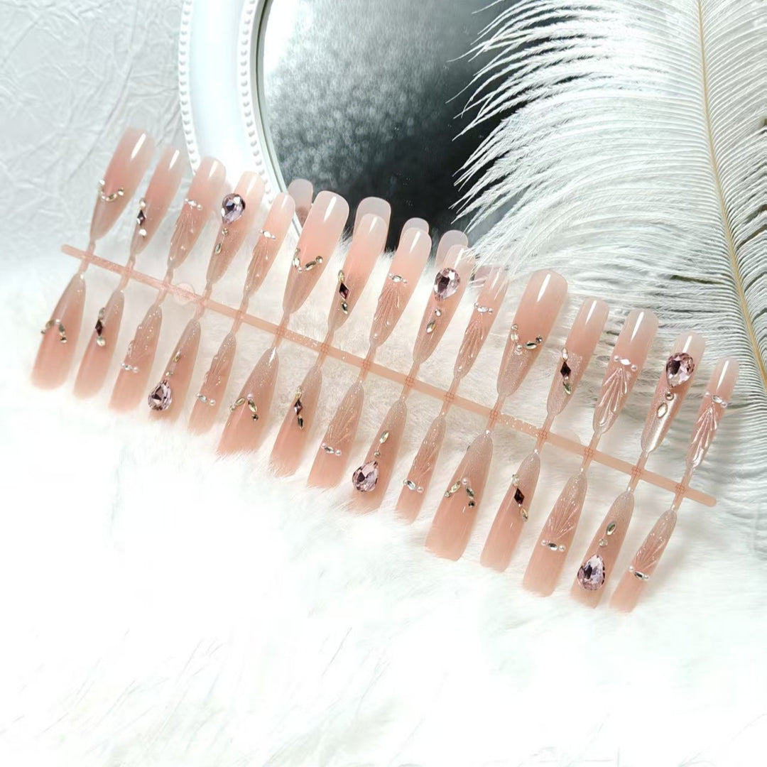 Artificial nails with glamorous crystal embellishments Kalsten