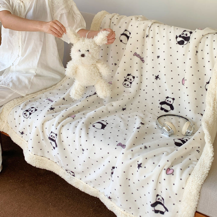 Reversible fleece blanket with cartoon cat design and teddy lining