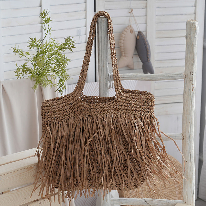 Trendy raffia bag with fringed details Kalsten