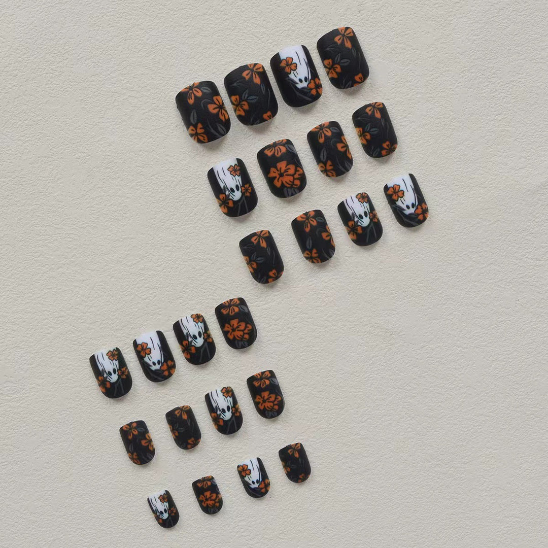 Acrylic nail set with spooky ghost design and floral accents Kalsten