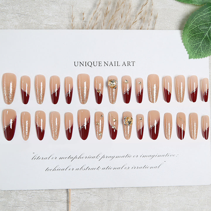 Acrylic nail set with elegant glitter design and exclusive embellishments Kalsten