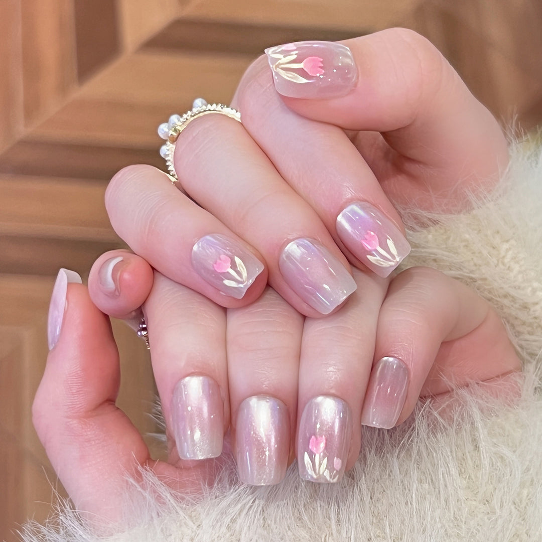 Artificial nail art with floral decorations Kalsten
