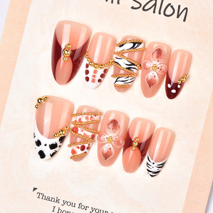 Artistic Press-On Nail Art Set with Floral and Gem Embellishments Kalsten