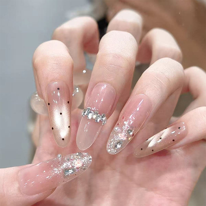 Artificial nail set with sparkling glitter and elegant jewelry details Kalsten