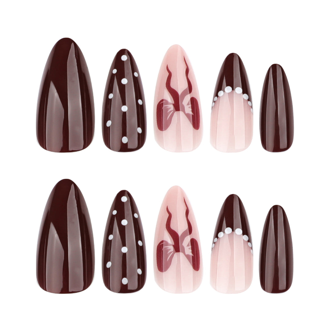 Elegantly designed stiletto nails with artistic accents Kalsten