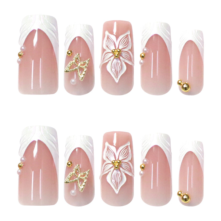 Elegant artificial nails with floral design and gold accents Kalsten