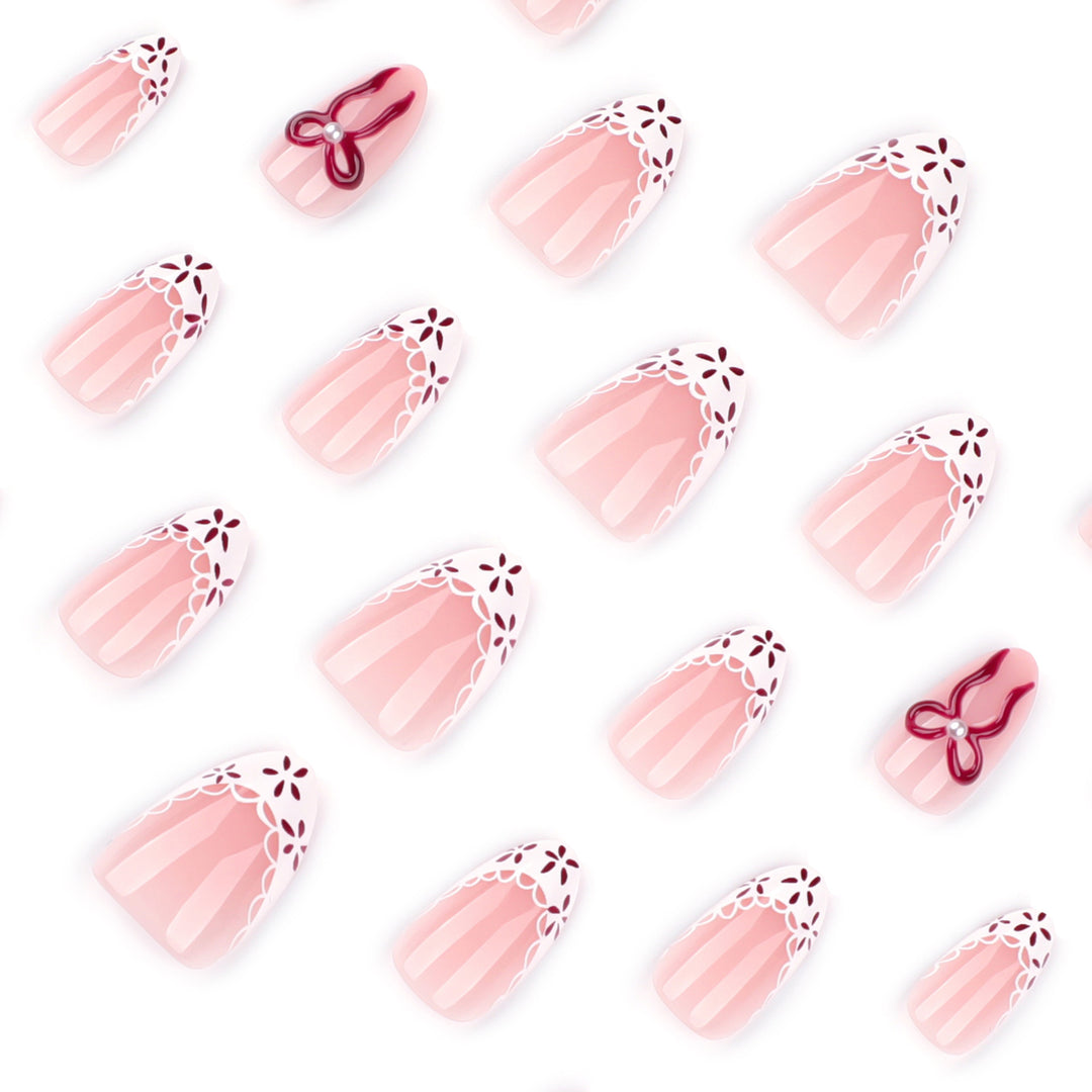 Artful stiletto nails with delicate floral accents Kalsten