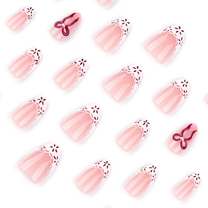 Artful stiletto nails with delicate floral accents Kalsten