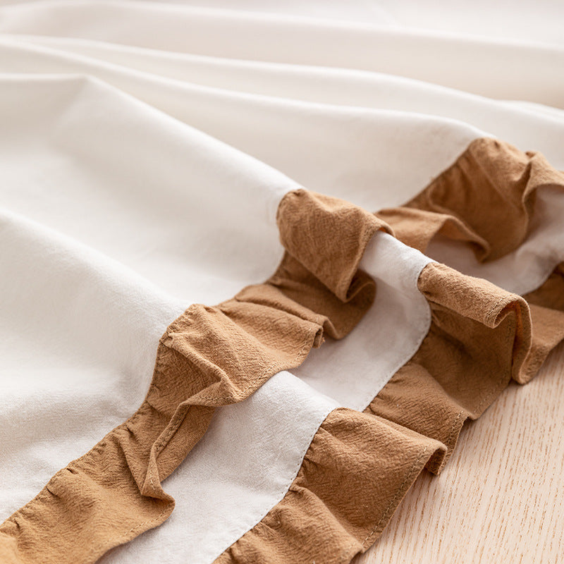 Rectangular tablecloth made of cotton-linen with double ruffle trim