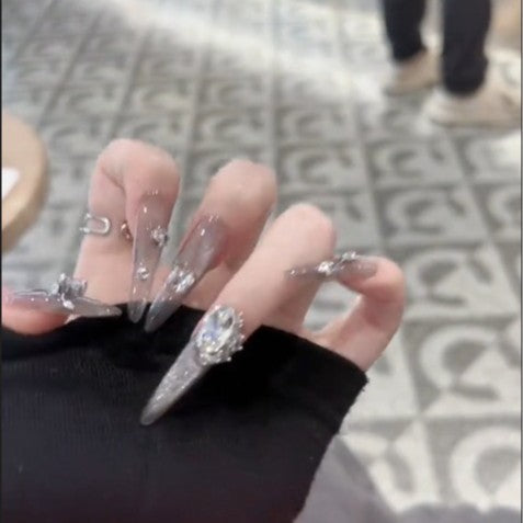 Glamorous artificial nails with rhinestone accents Kalsten