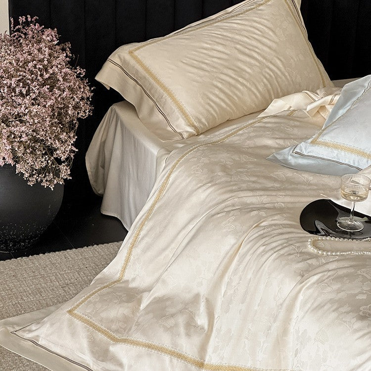 Luxurious cotton satin bedding set with jacquard floral pattern and embroidered border