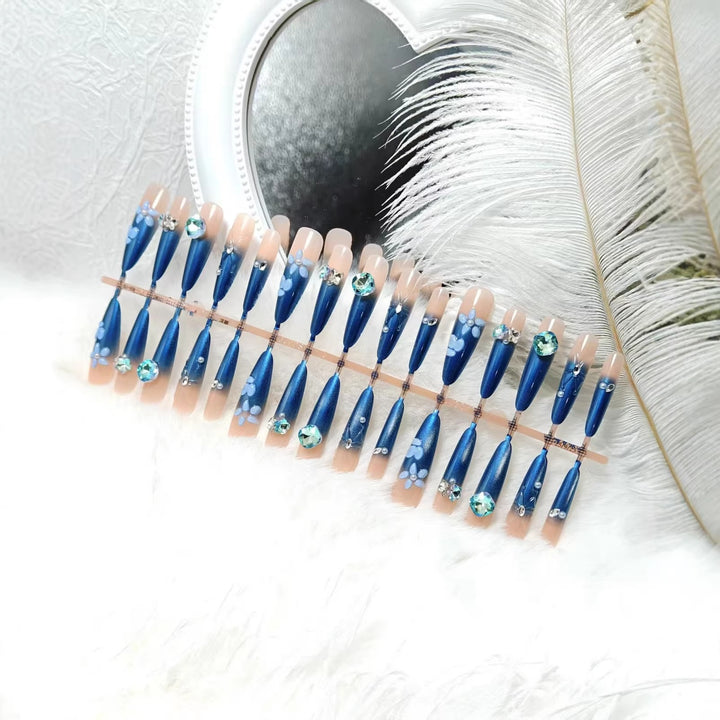 Elegant artificial nails with floral applications and glitter elements Kalsten