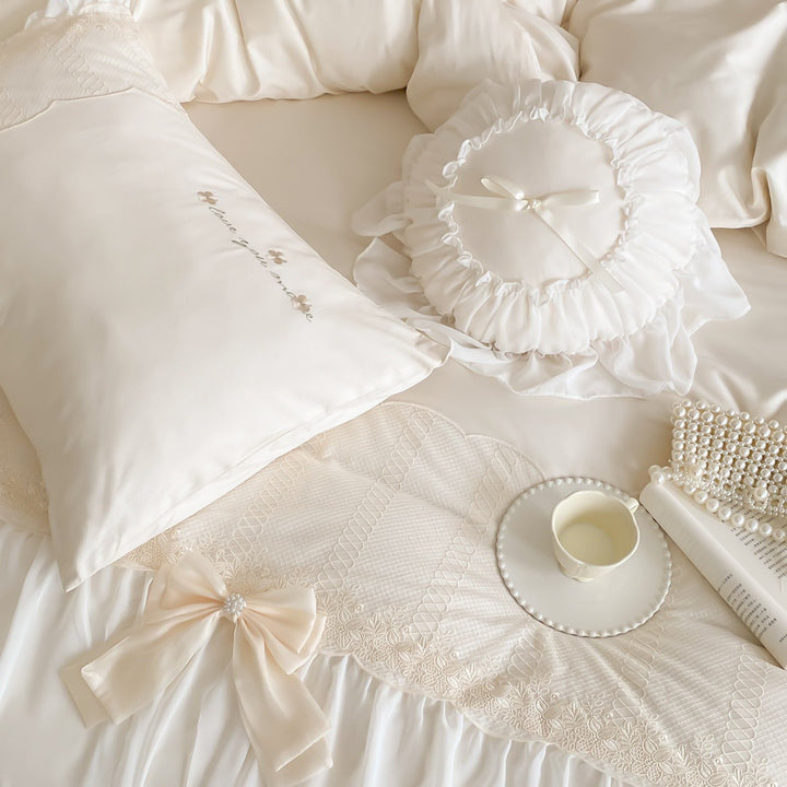 Romantic ruffle duvet cover set with frill, bow appliqué and delicate embroidery