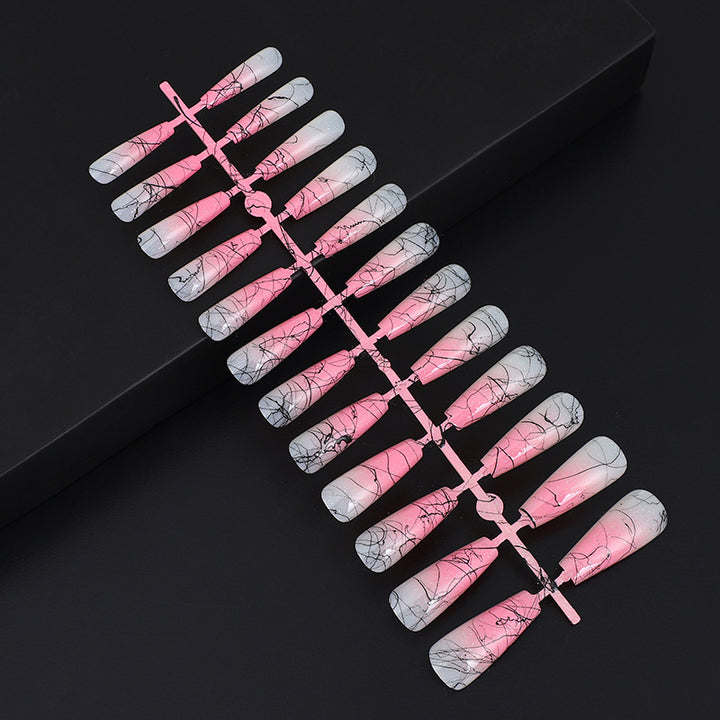 Artificial nails in modern ombre design with marbled accents Kalsten