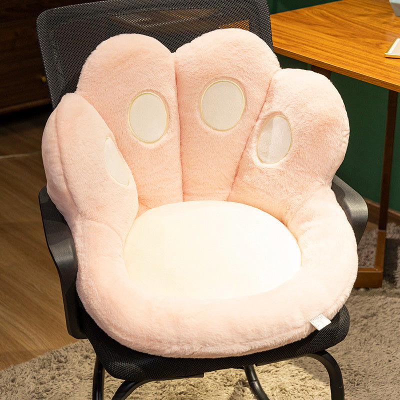 Plush pet bed with raised edge and removable cuddly pillow