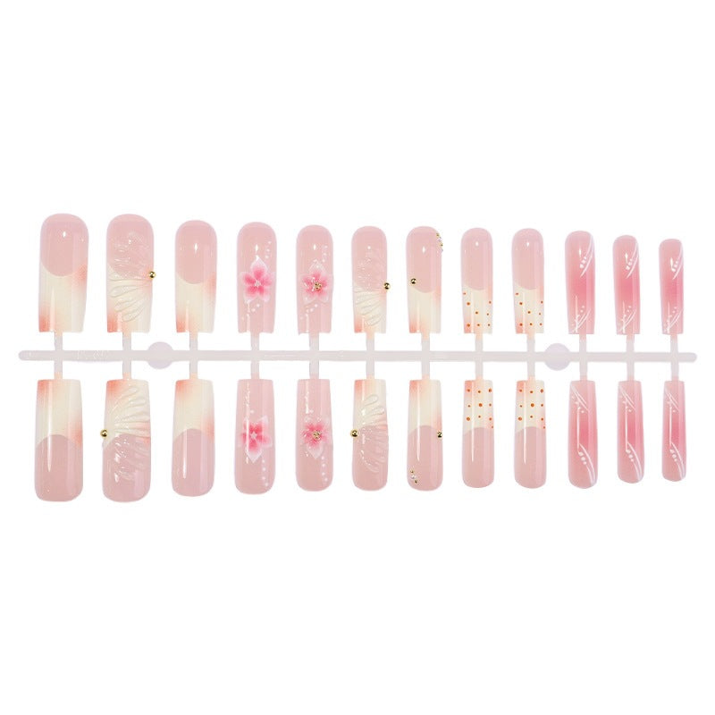 Creative nail art set with floral accents and glitter details Kalsten