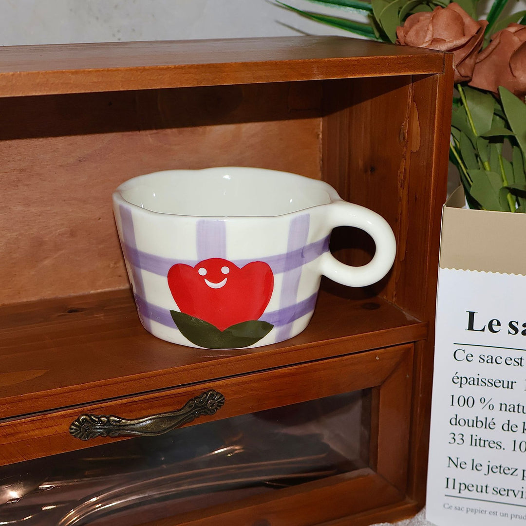 Ceramic mug with hand-painted penguin pattern