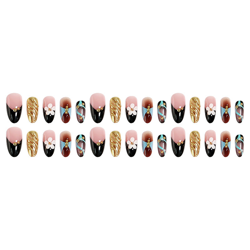 Artificial nail set with filigree floral decorations and glamorous accents Kalsten