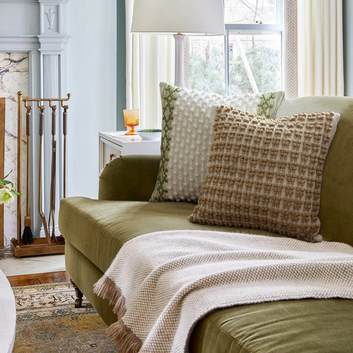 Woven Boho decorative cushion with tassels, tufted relief and handcrafted details