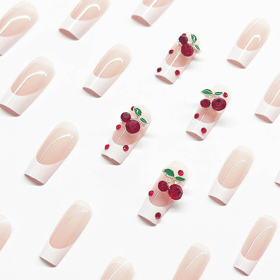 Acrylic nail set with chic cherry motifs and elegant French tip Kalsten