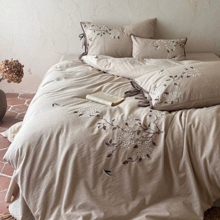 Embroidered bedding set made of linen look with decorative stripes and floral embroidery