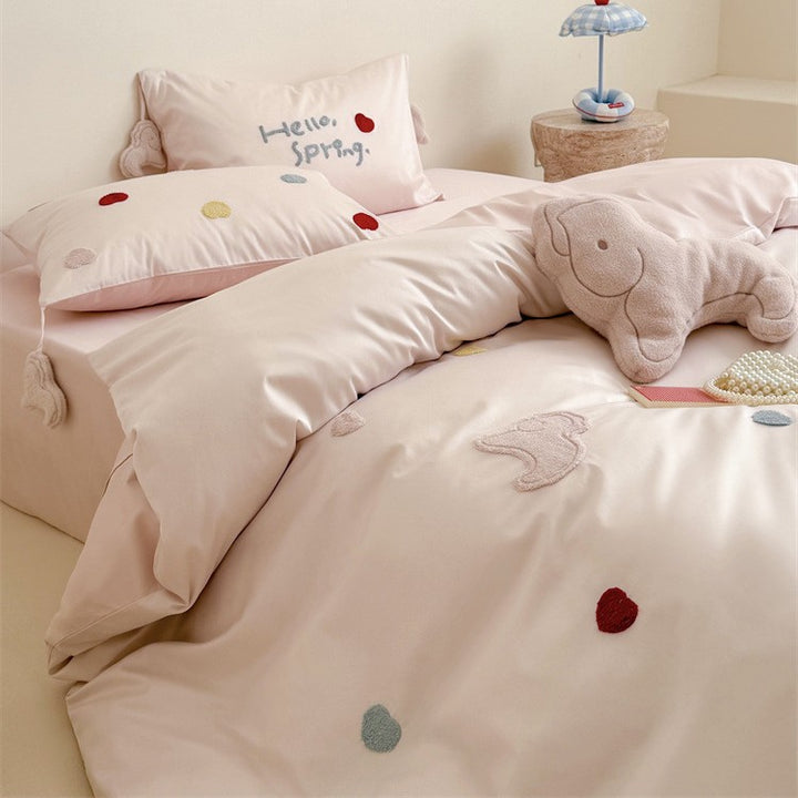 Reversible cotton satin bedding with embroidered heart appliqués and silky-matte finish Kalsten