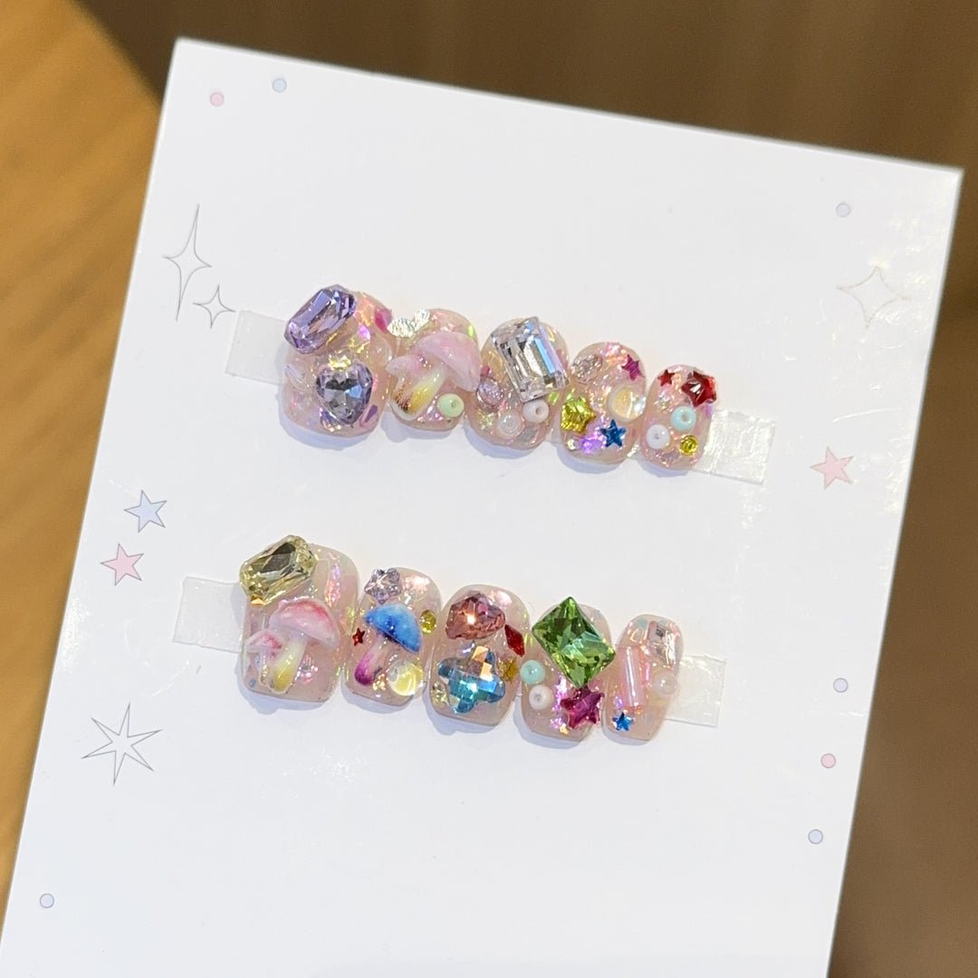 Artificial nails with sparkling crystal accents Kalsten