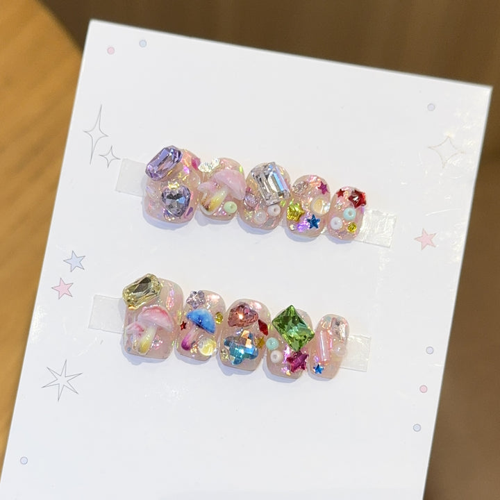 Artificial nails with sparkling crystal accents Kalsten