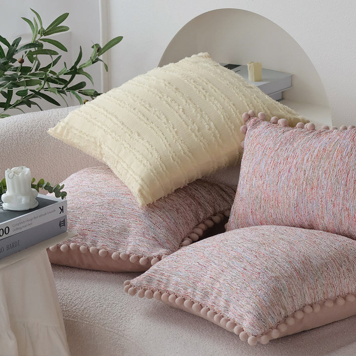 Rectangular decorative pillowcase with mottled chenille structure and pompom trim Kalsten