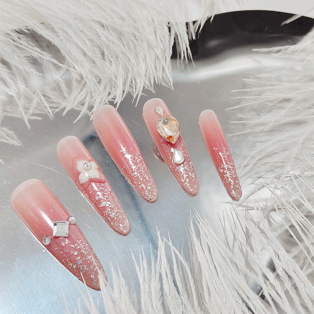 Shiny artificial nails with rhinestones and glitter Kalsten