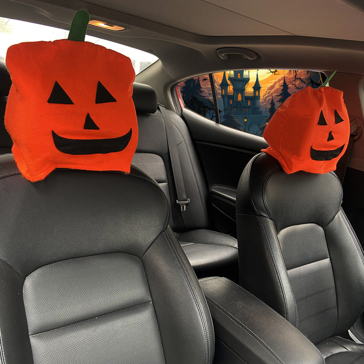 Plush decorative pillow with pumpkin face
