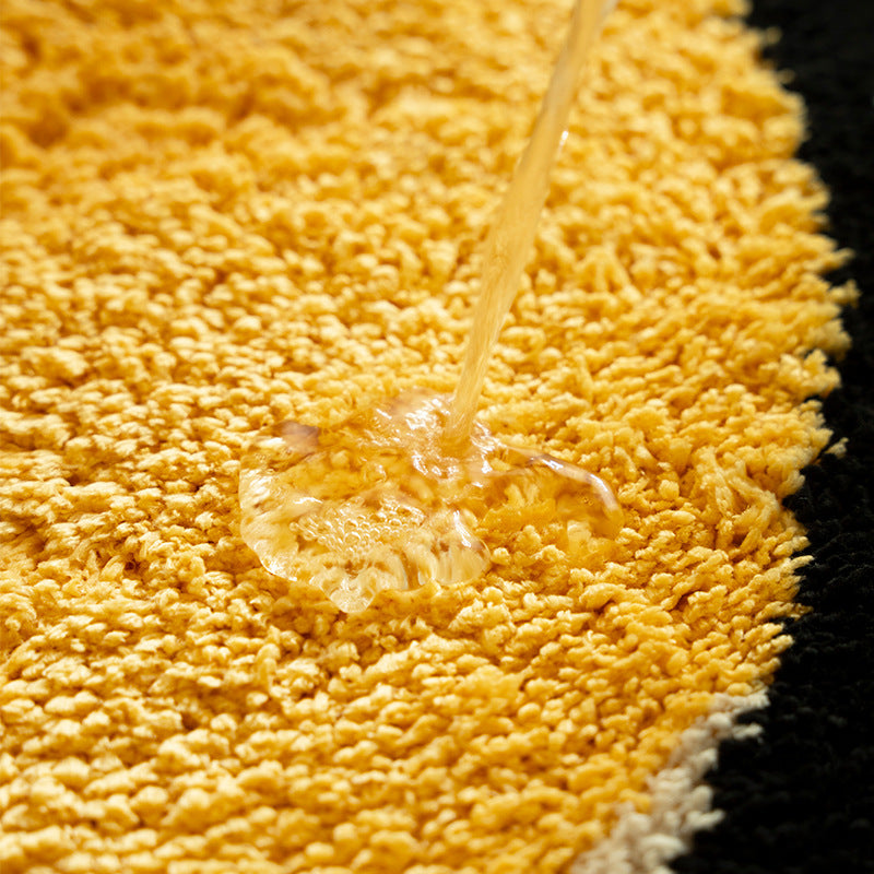 Playful children's rug in cheese shape with tufted chenille surface and non-slip backing Kalsten