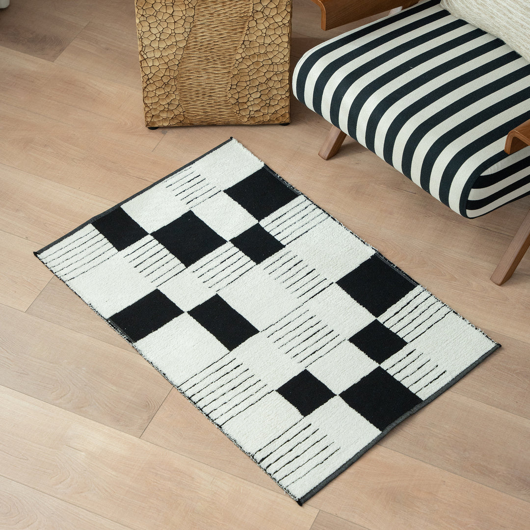 Modern runner rug with graphic checkerboard pattern and short pile structure Kalsten