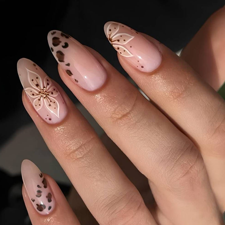 Elegant artificial nails with floral design and Kalsten accents