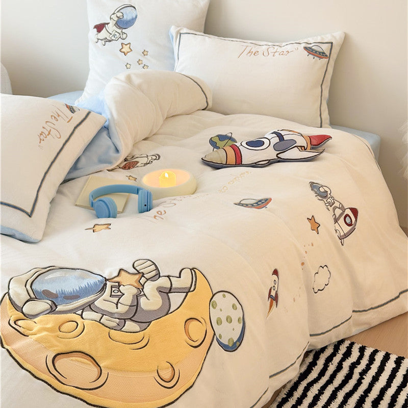 Child bedding set made of soft cotton blend with embroidered astronaut and rocket motif