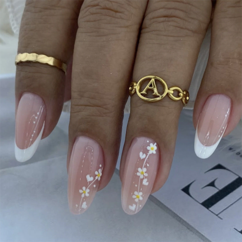Artful Nail Extensions with Delicate Floral Patterns Kalsten