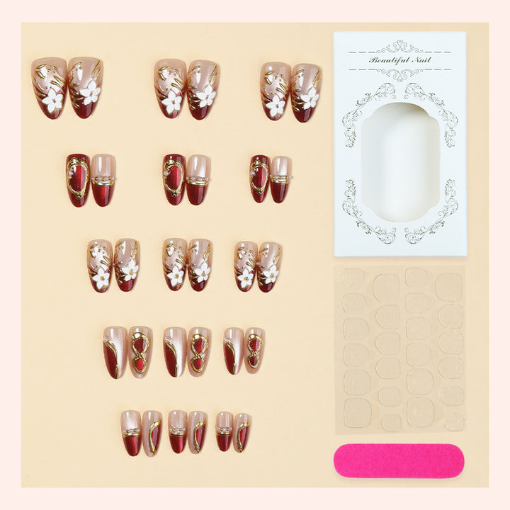 Artistic Press-On Nail Set with Floral and Metallic Accents kalsten
