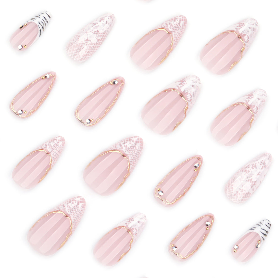 Artful stiletto nails with gold and tip embellishments Kalsten