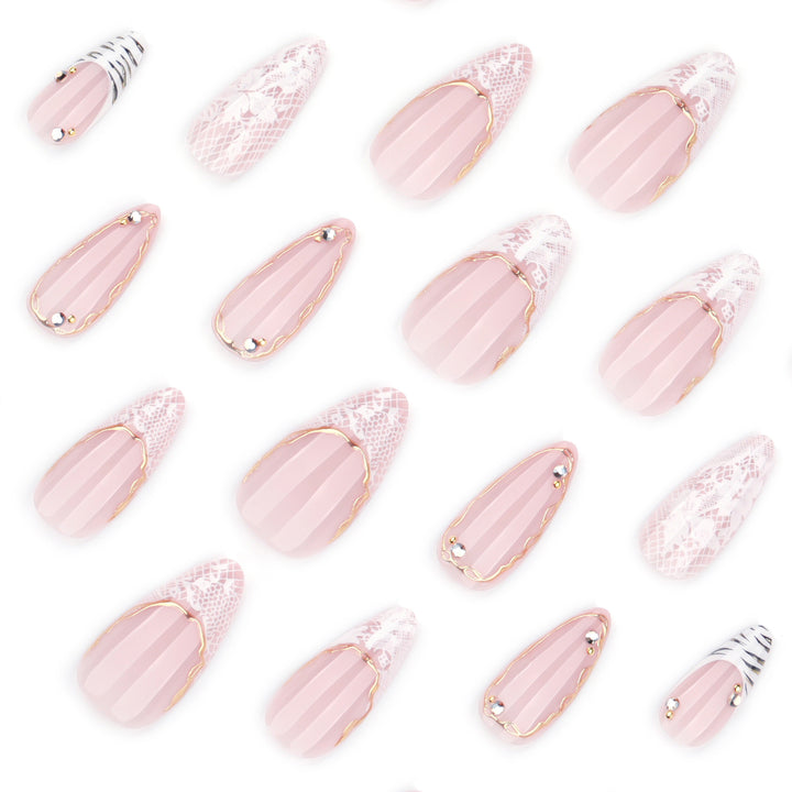 Artful stiletto nails with gold and tip embellishments Kalsten
