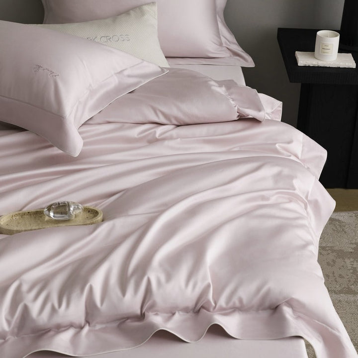 Bedding set made of fine satin with a silky-smooth finish and embroidered logo