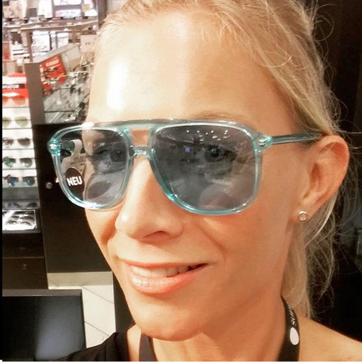 Women's fashionable sunglasses in transparent design with colored lenses Kalsten