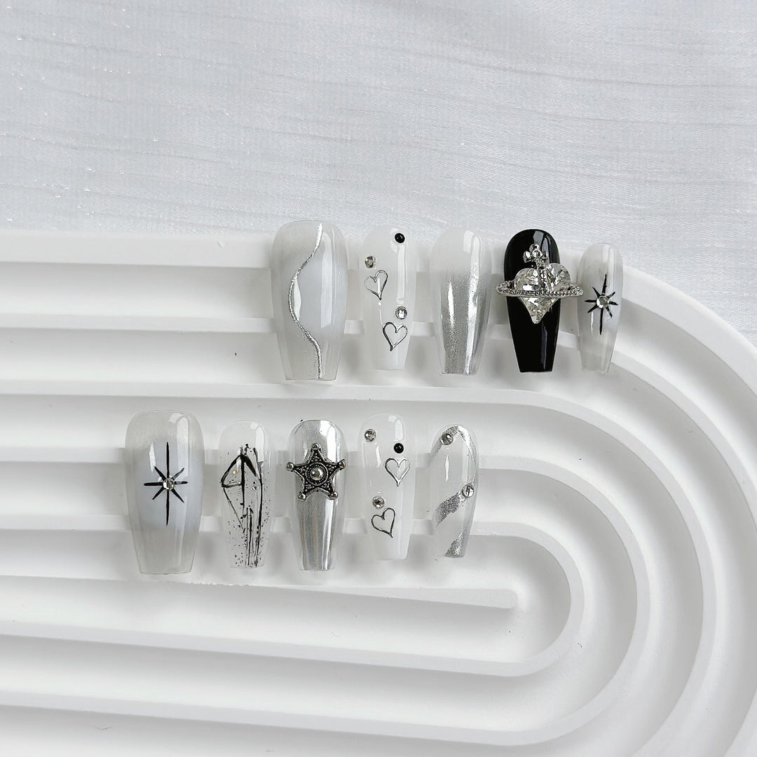 Artistic Press-On Nail Art Set with Heart and Celestial Designs