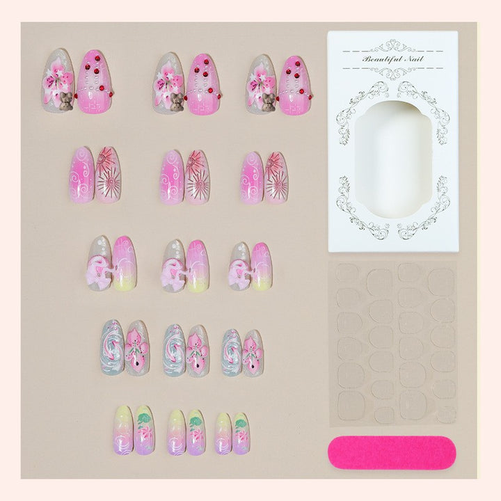 Creative nail art set with floral and playful designs Kalsten