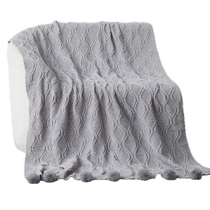 Ladies knit blanket with decorative pom poms Kalsten