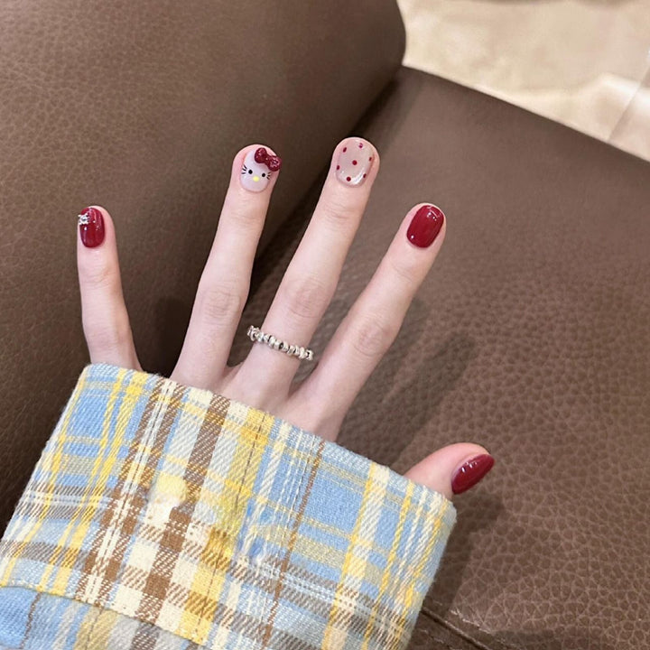 Artificial nail set with playful designs Kalsten